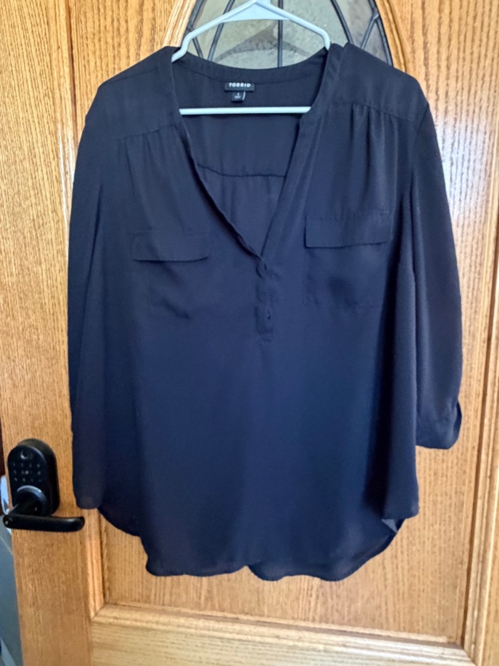 Torrid black blouse with pockets and 3/4 sleeves. Size: 1